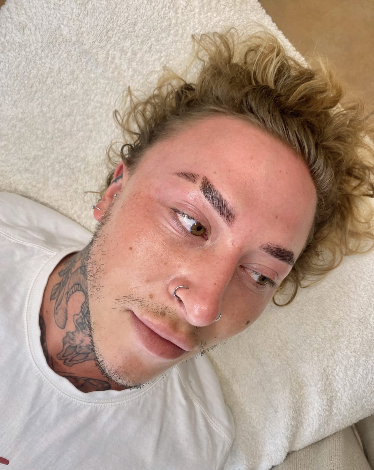 Brows on a male client with curly hair