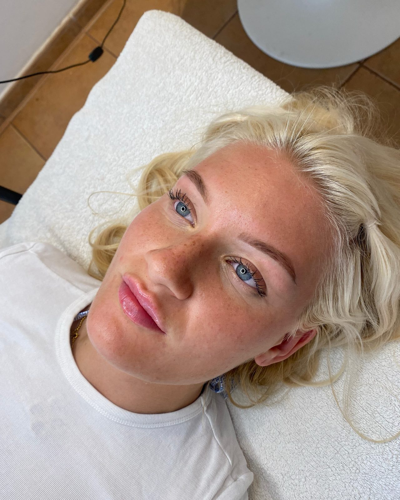 Shaped and tinted brows on a client with blonde hair